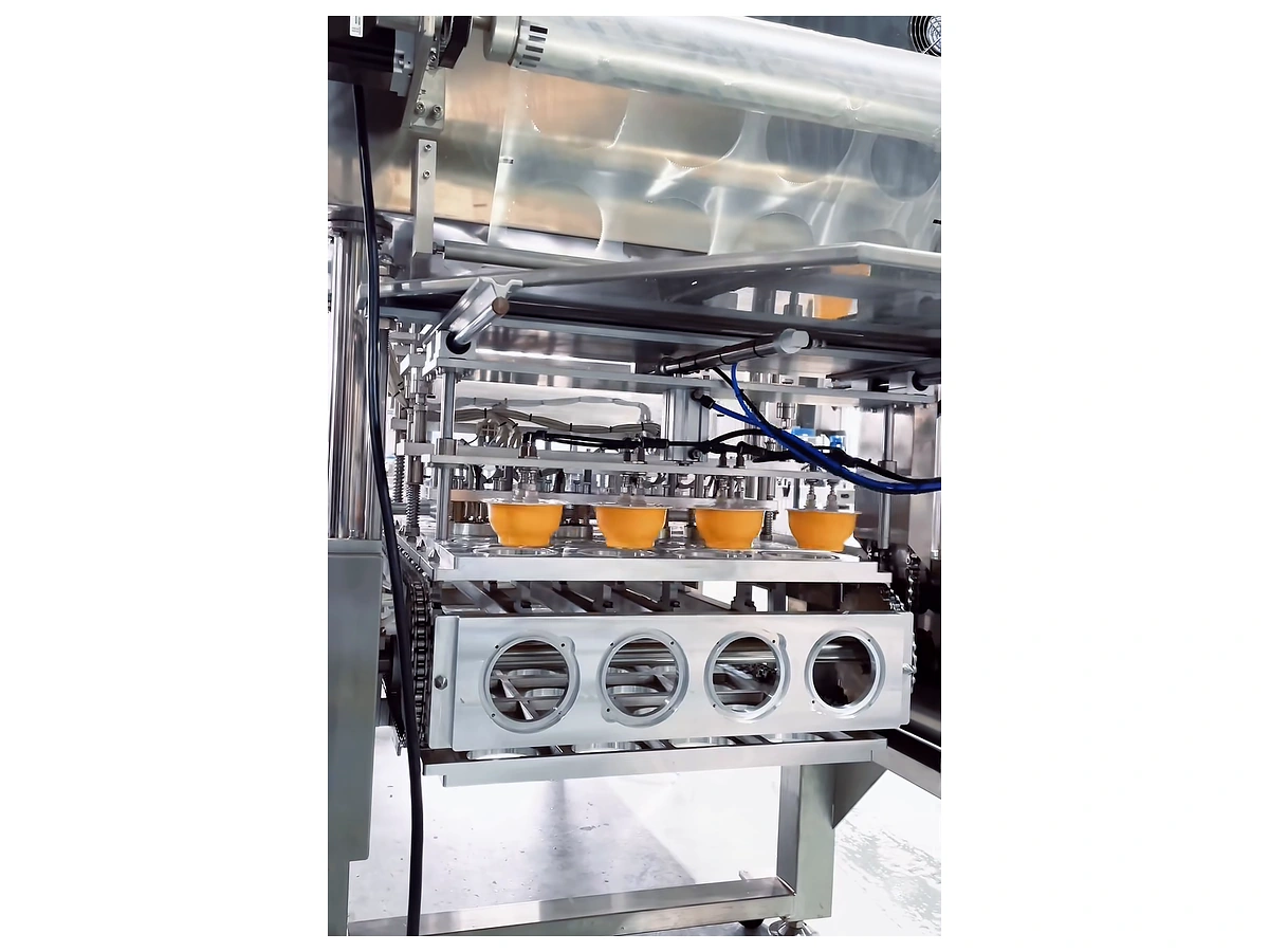 YIJIA Four-Cavity Chain Conveyor Cup Filling and Sealing Machine